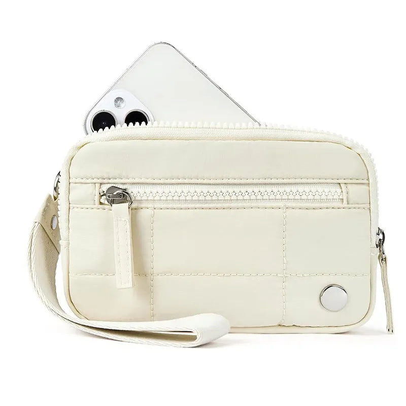 Waterproof quilted women's handbag with transparent deck in beige colour