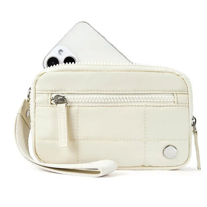 Waterproof quilted women's handbag with transparent deck in beige colour
