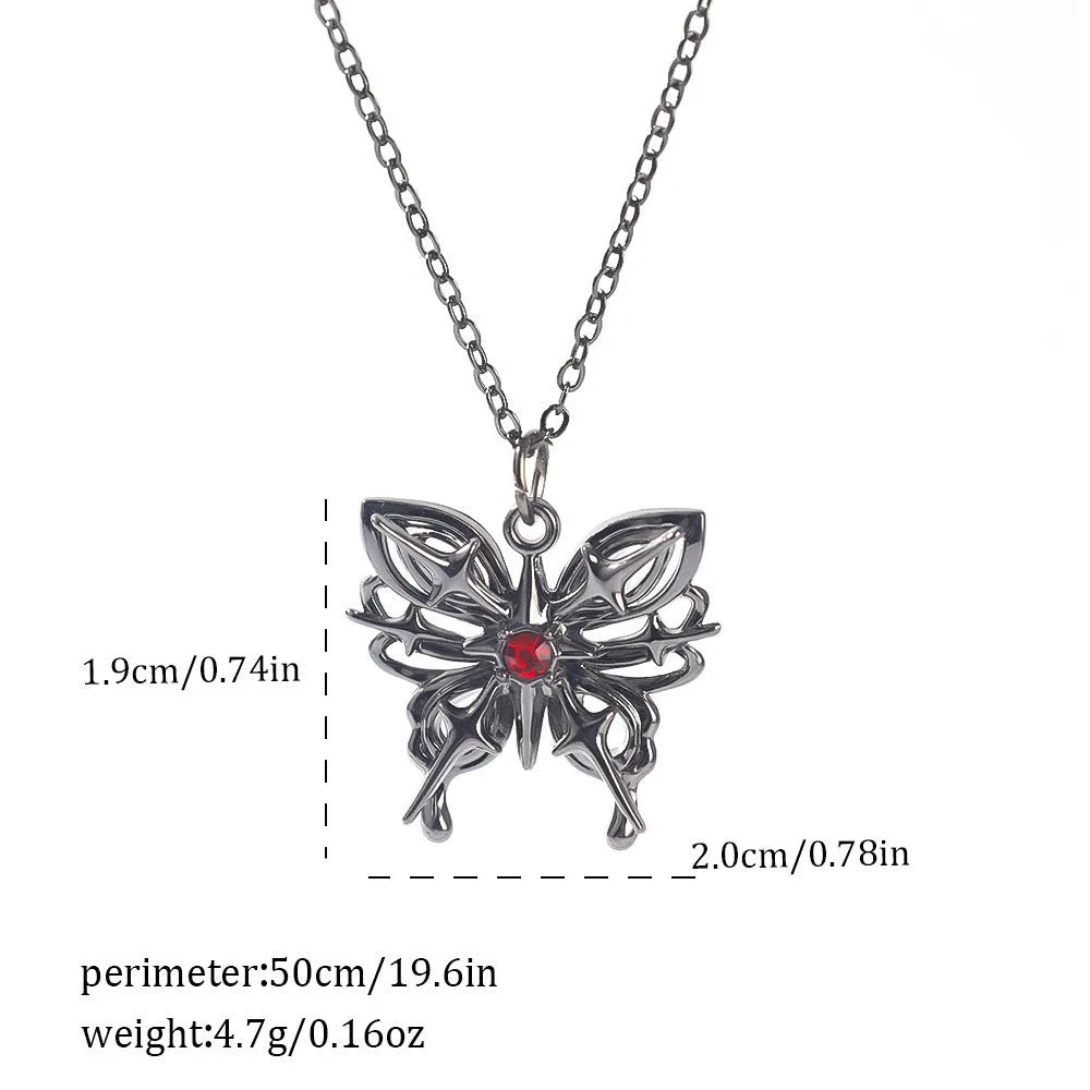 Gothic style zinc alloy necklace with bat pendant on a silver chain against dark background.