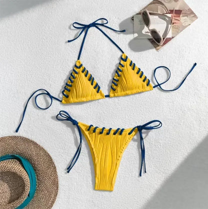 Women's solid colour polyester bikini with eye rope detail, briefs style, sizes S M L