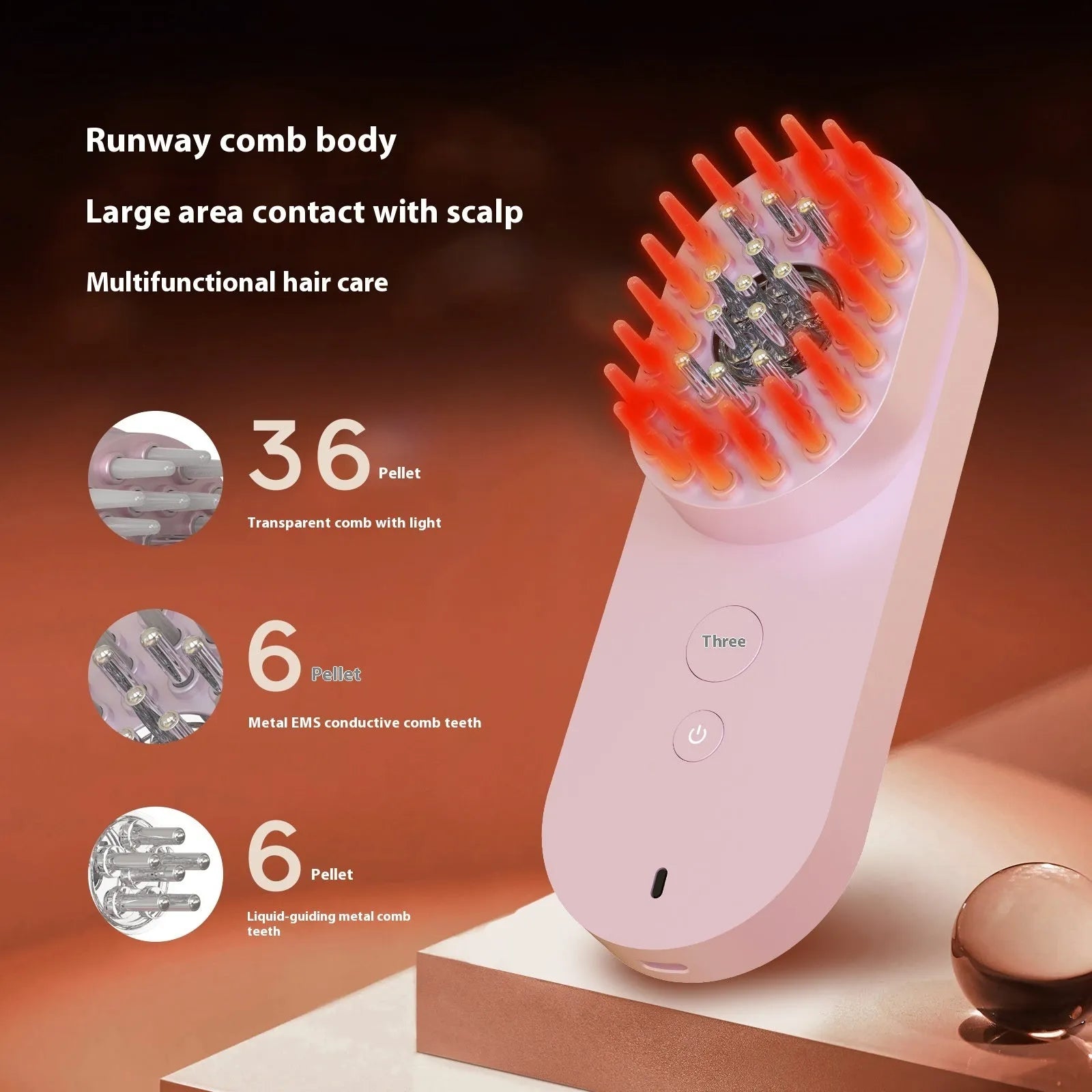 Compact pink and black smart scalp massage comb with red light therapy, shown next to a ruler for scale under 10cm.