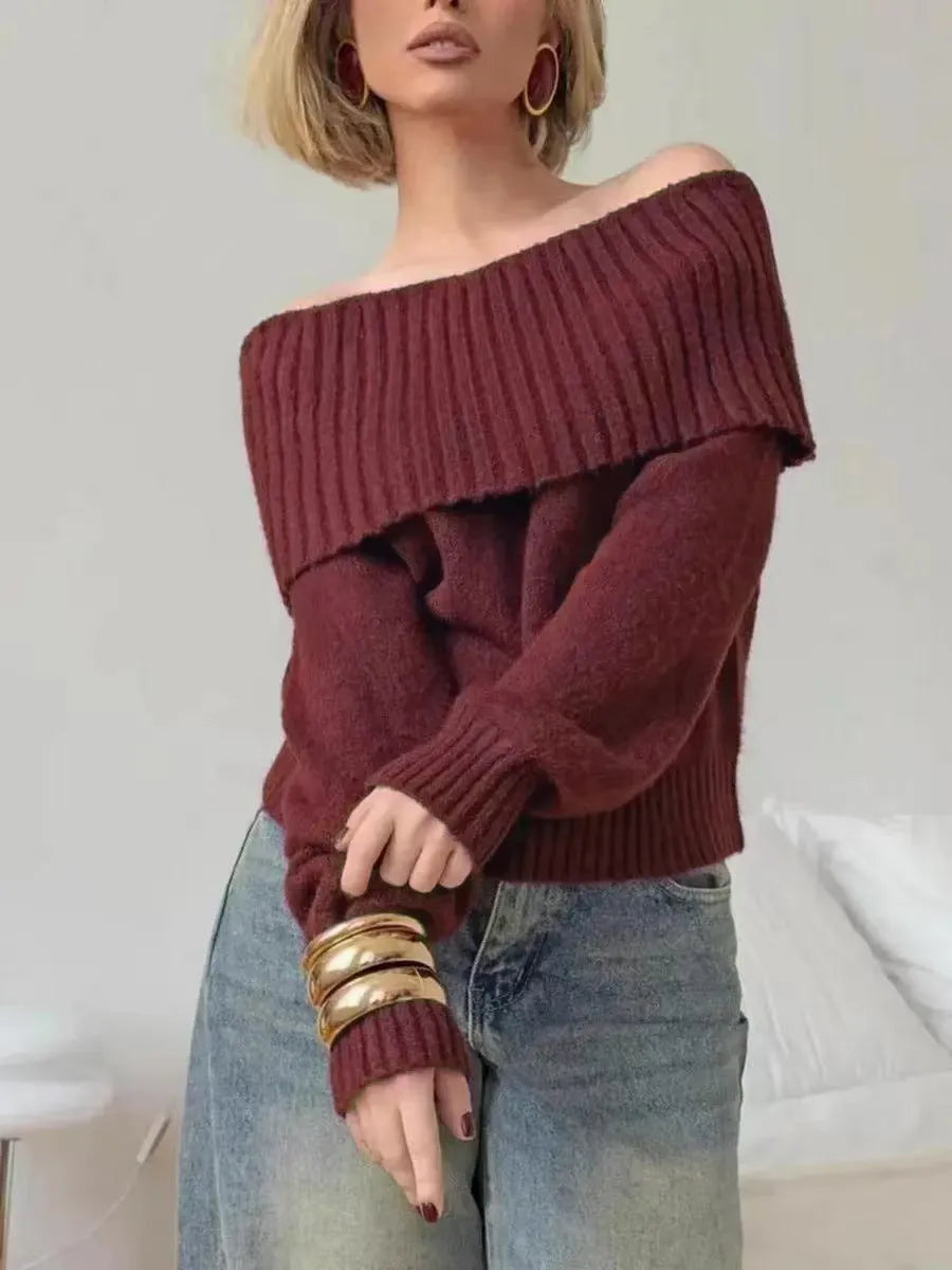 Grey off-shoulder acrylic sweater with 3D pattern texture, showing strapless design and regular sleeves