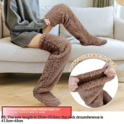 Cozy over-the-knee fuzzy socks in various colors, including brown, blue, dark gray, pink, silver, and more. Comfortable cotton design for warm, snug legs.