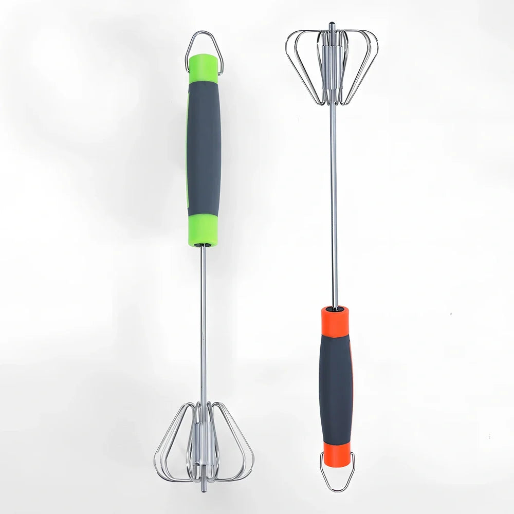 Stainless steel manual egg beater showing three size options with green and orange handles
