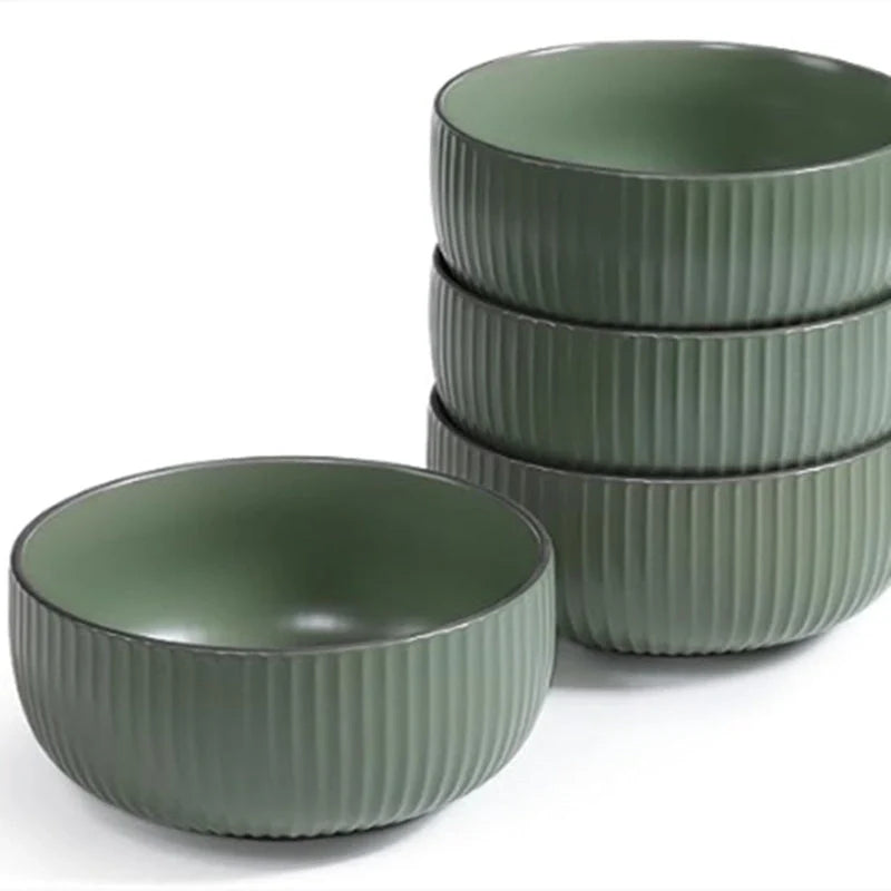 Elegant 4-piece ceramic bowl set, perfect for cereals, salads, and more. Microwave, oven, and dishwasher safe.