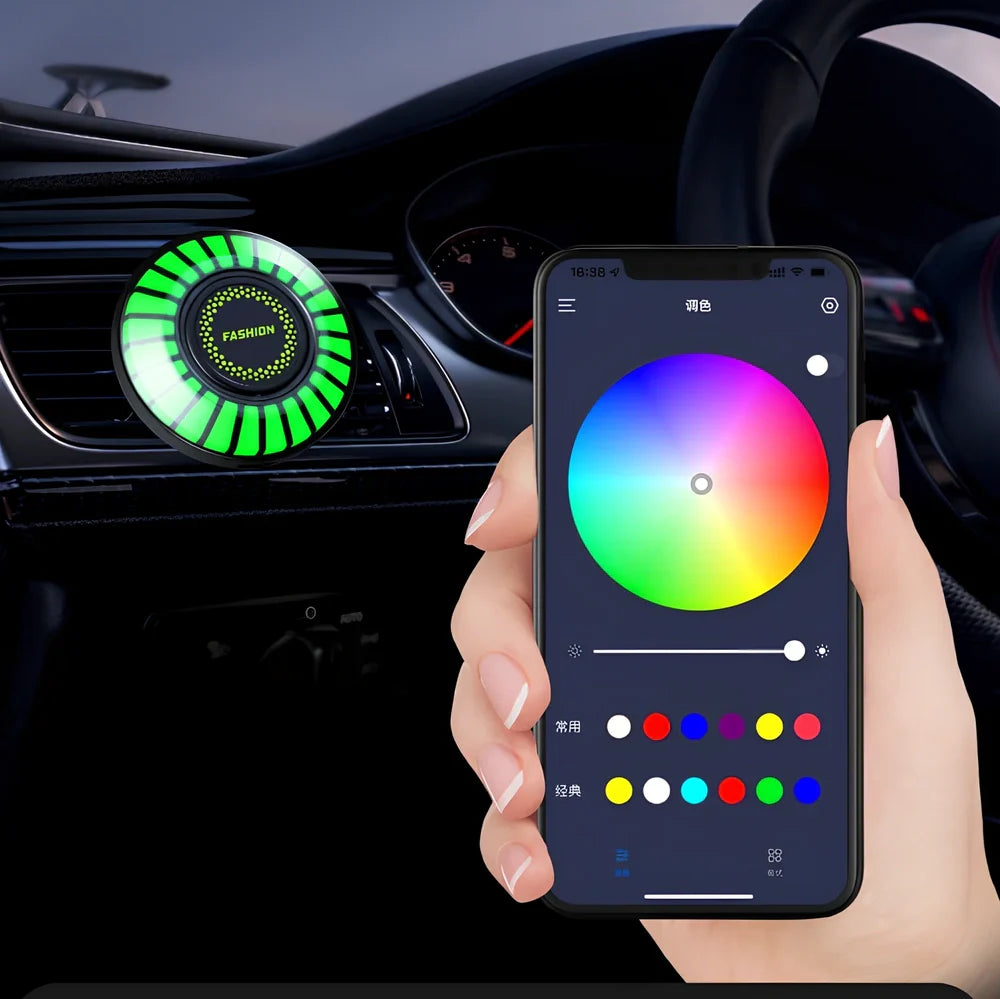 Car aromatherapy RGB light with 24 LEDs showing colour-changing patterns on vehicle air vent
