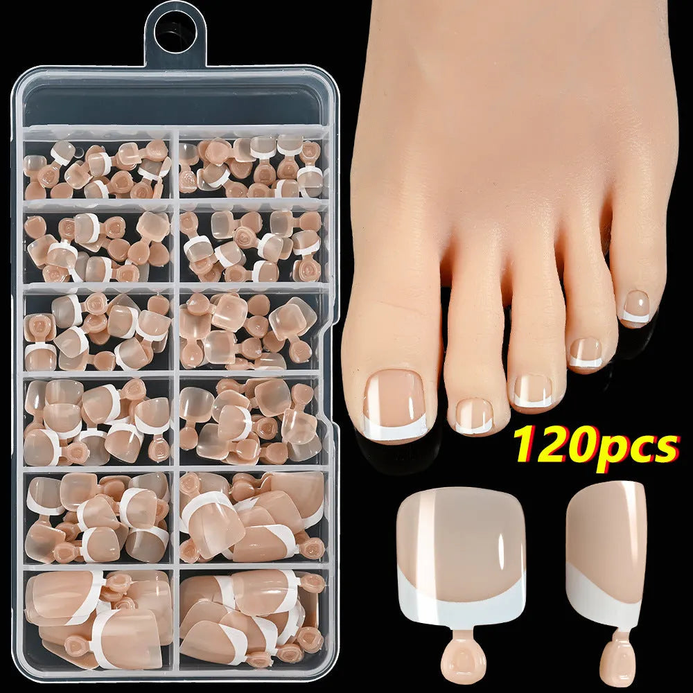 Box of 120 full square short artificial nail tips with French white edges in multiple nude shades.
