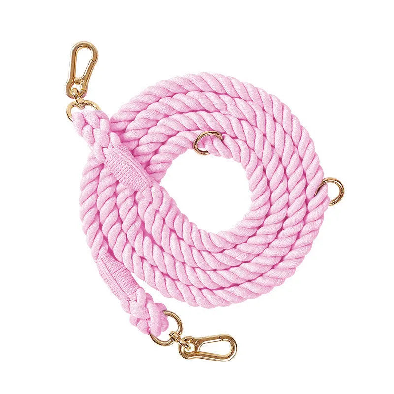 Woven rainbow pattern dog leash with double grip handles and a metal clasp.