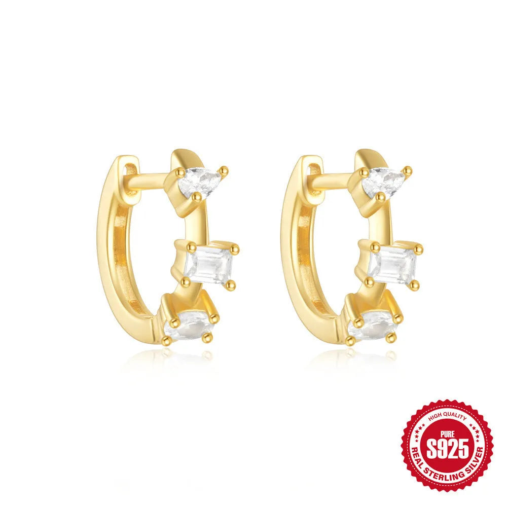 Sterling silver geometric stud earrings with small round diamond accents in gold or silver finish