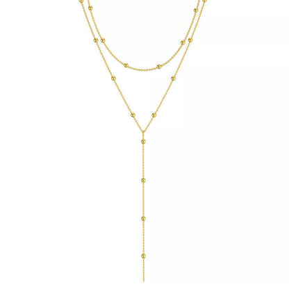 Geometric tassel clavicle necklace with round beads in gold and silver