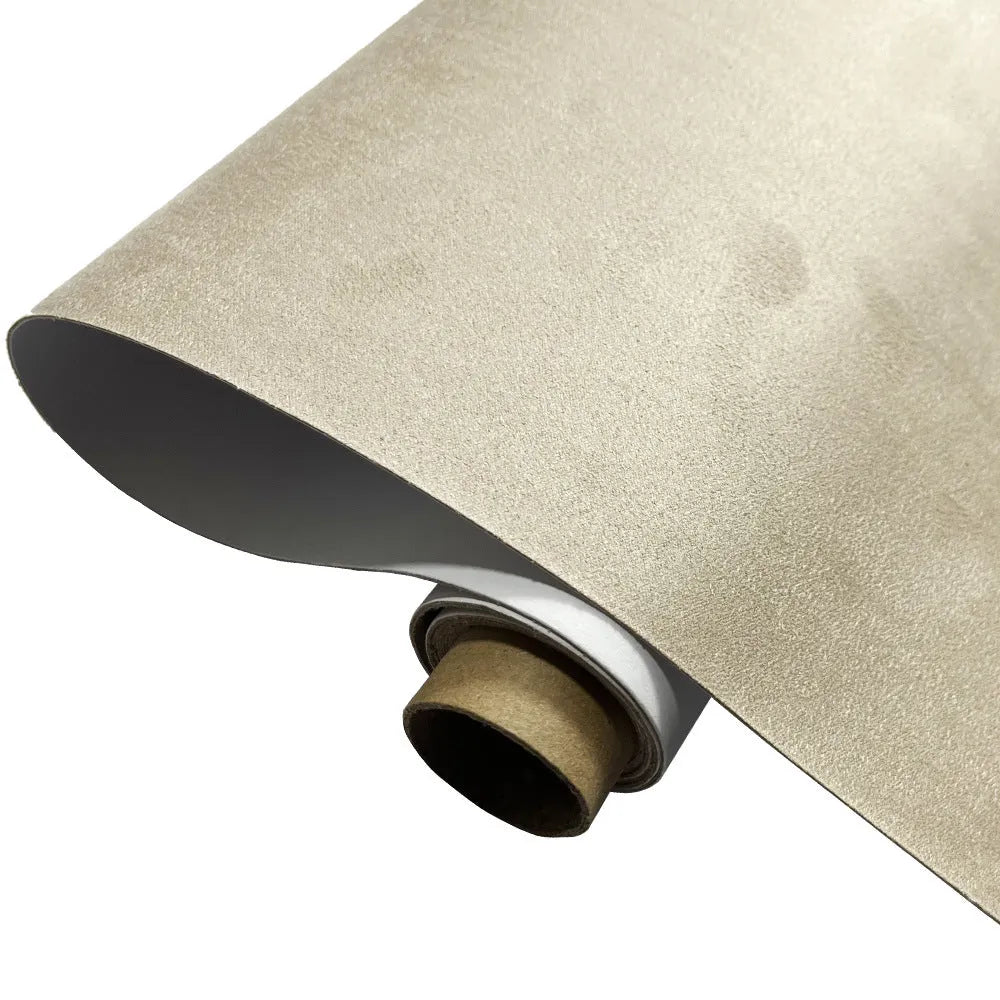Rolls of self-adhesive leather suede in multiple colours showing texture and adhesive backing.