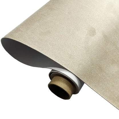 Rolls of self-adhesive leather suede in multiple colours showing texture and adhesive backing.
