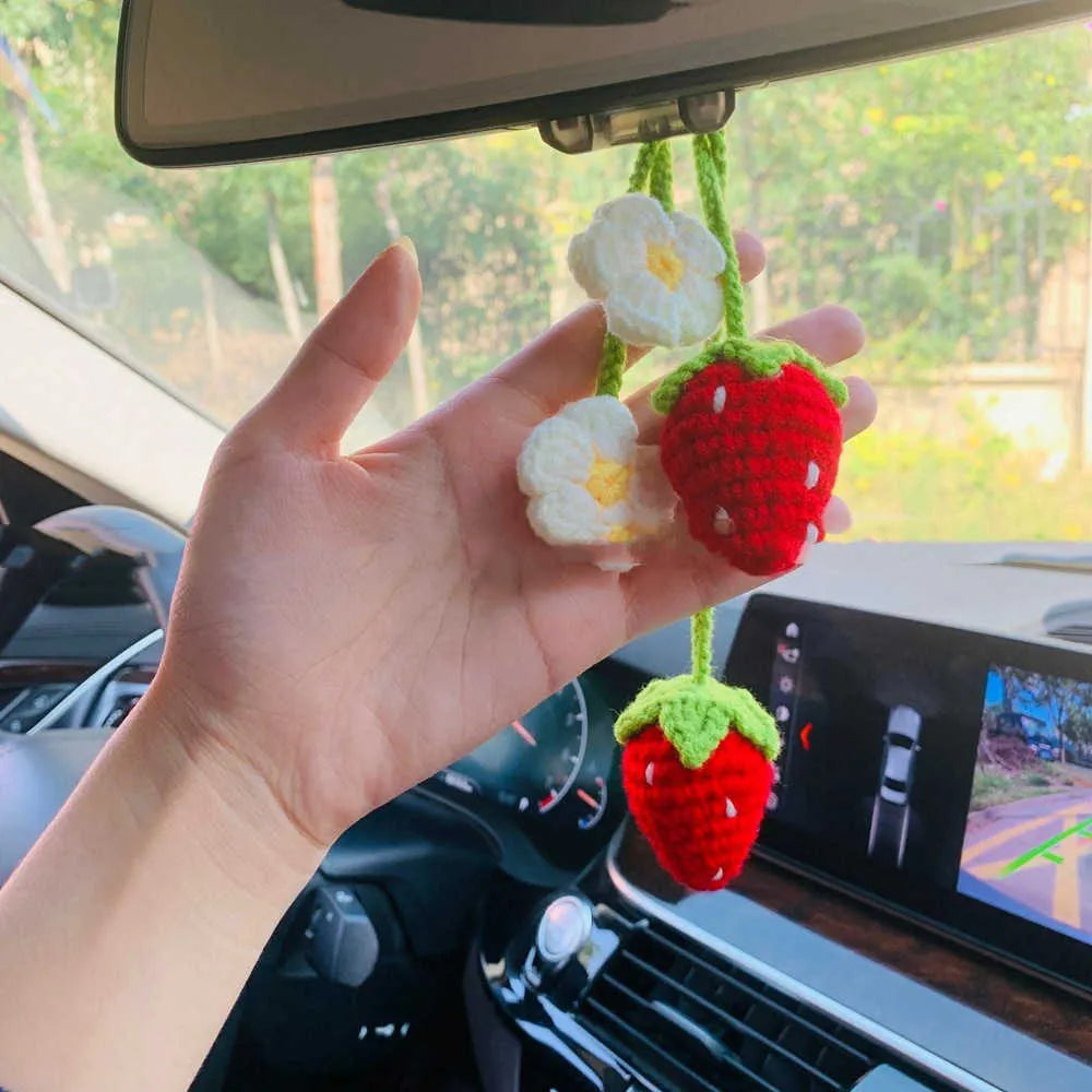 Handmade strawberry-shaped car pendant woven from cotton and hemp fibres, approximately 10-12cm long