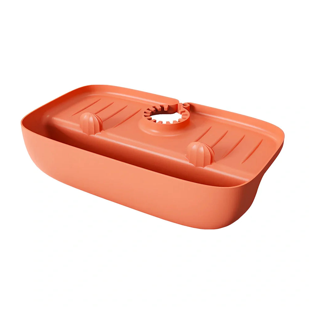 TPE kitchen drain rack with irregular shape measuring 27x14x5cm in orange colour