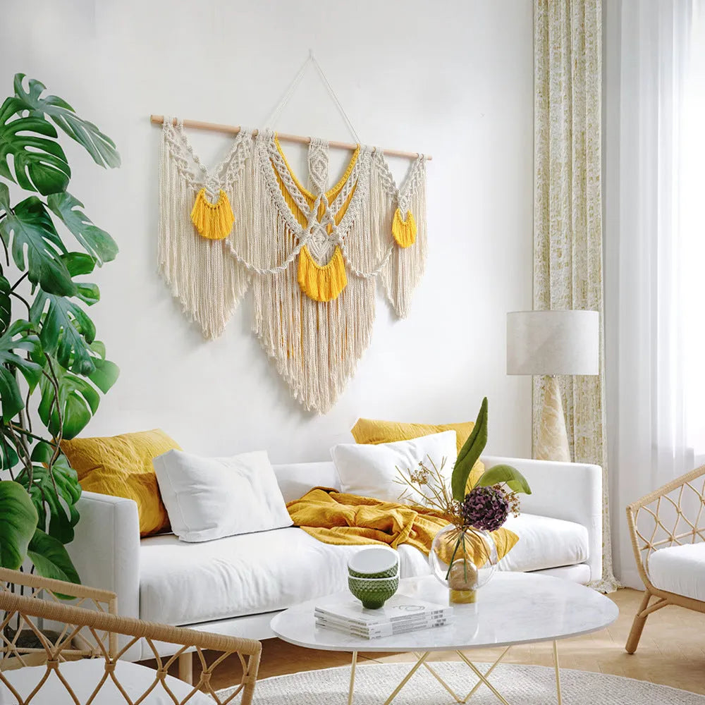 Creamy white hand-woven cotton tapestry with a rectangle shape for wall decor.