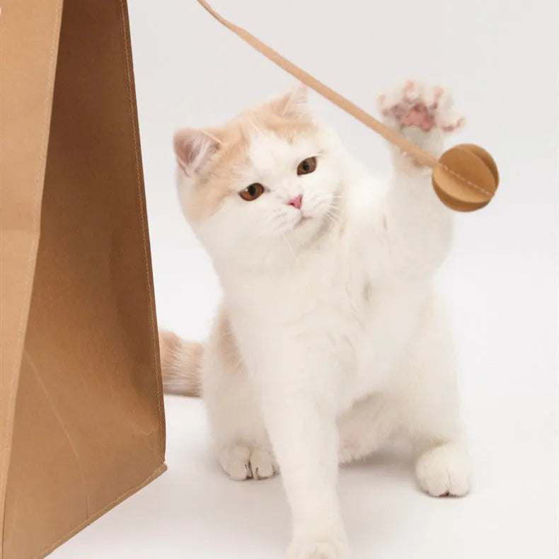 Brown cat scratch board integrated with paper bag nest measuring 40cm wide x 53cm high