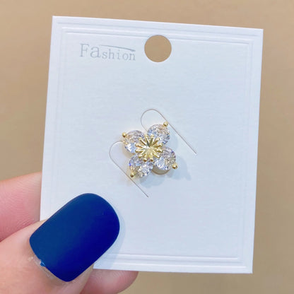 Copper electroplated geometric brooch for women, shown in one of six colour variants.