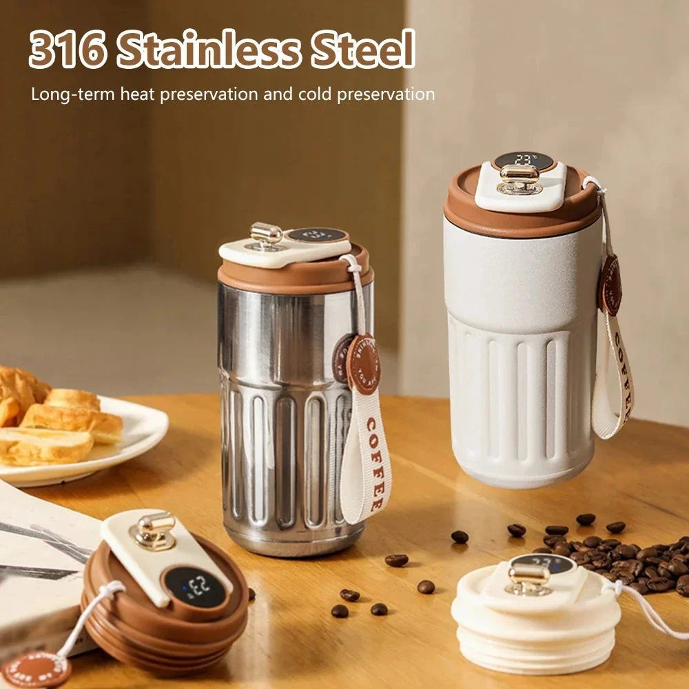 Portable digital stainless steel thermal bottle with temperature display, insulated for hot and cold drinks, designed for on-the-go use