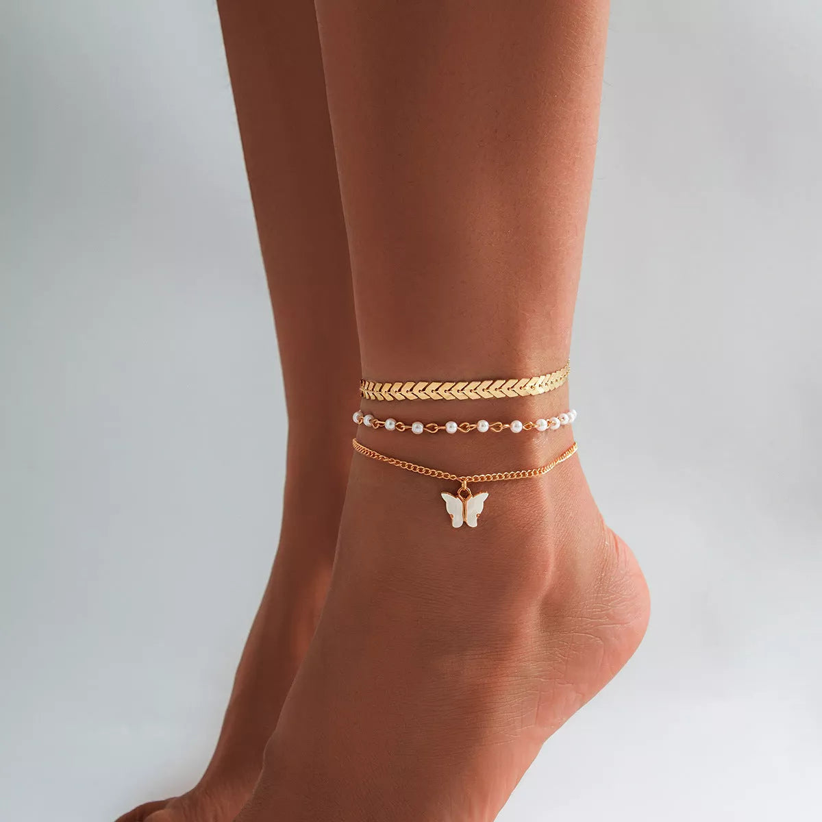Beach Star Tassel Ankle Ring in gold and black, lightweight summer jewelry