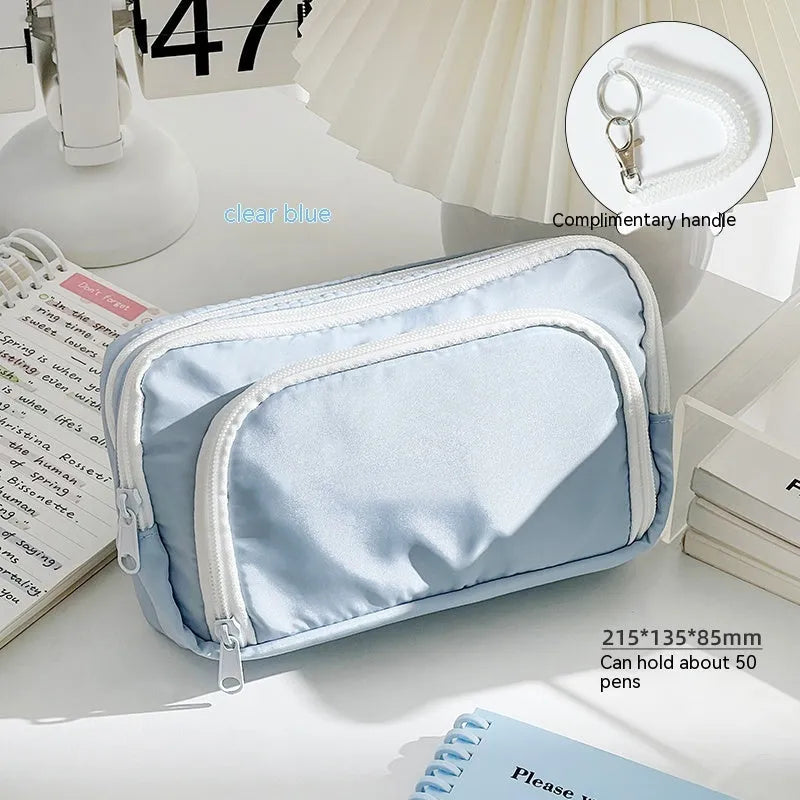 Double layer pencil case in solid colour with gift handle, dimensions 215mm by 135mm