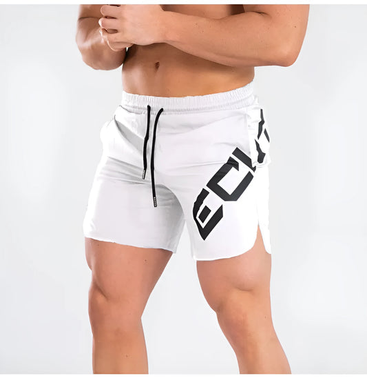 Men's black quick-dry training shorts with elastic waistband, shown knee-length.