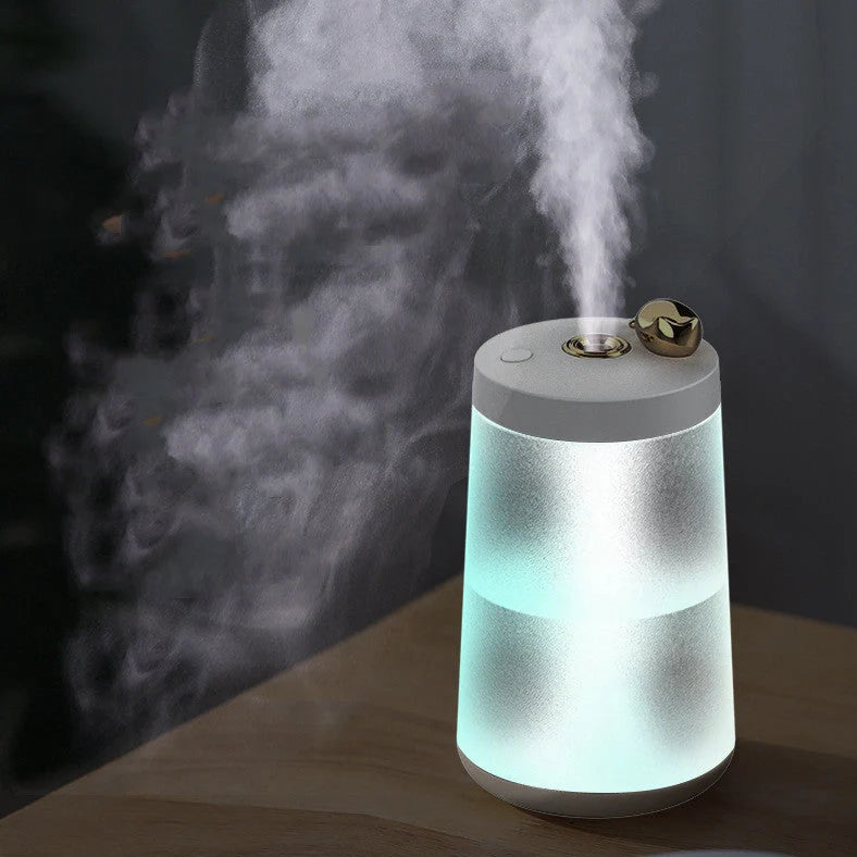 Columnar cat humidifier with electroplated finish and USB cable connection