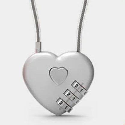 Peach heart-shaped ABS plastic bicycle helmet lock with a long steel cable, shown in various colours.