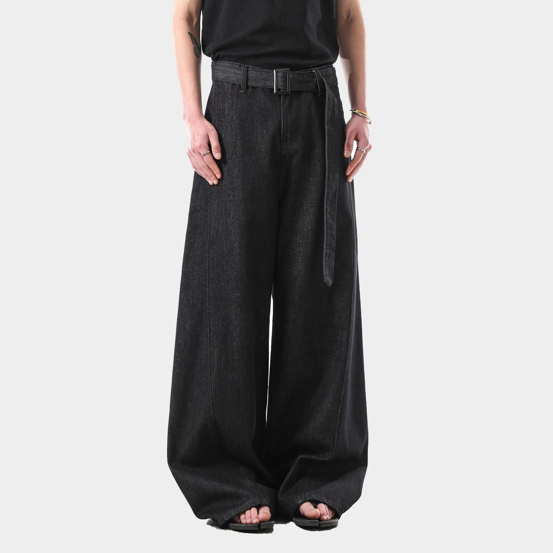 Black high-waist straight-leg jeans with zip placket fly, made from cotton denim fabric