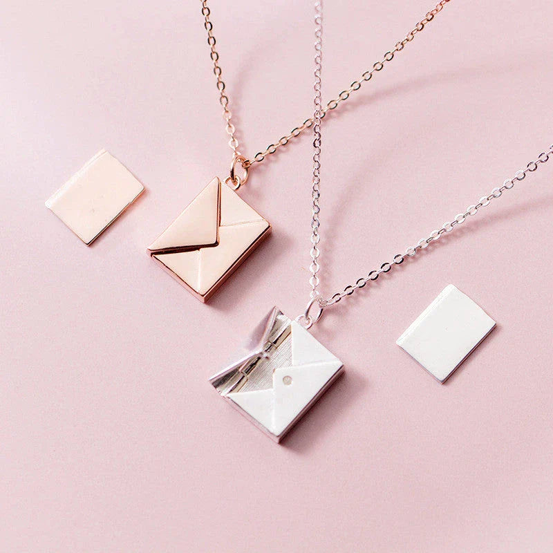 Stylish titanium steel envelope necklace with a discreet compartment for storing personal keepsakes