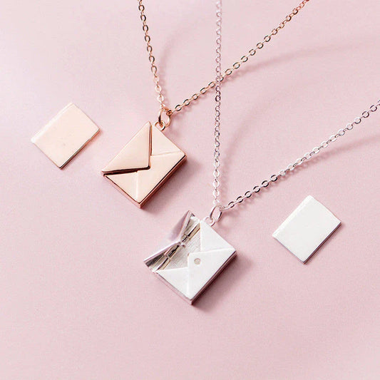 Stylish titanium steel envelope necklace with a discreet compartment for storing personal keepsakes