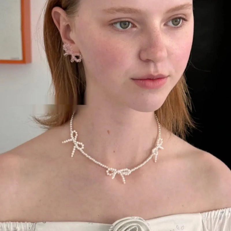 Sweet bow pearl necklace women's simple design clavicle chain with 31cm-40cm adjustable length imitation pearl geometry jewellery accessory