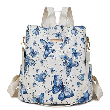 Butterfly printed large capacity PU backpack in various colours with sewing line details and an ergonomic back.