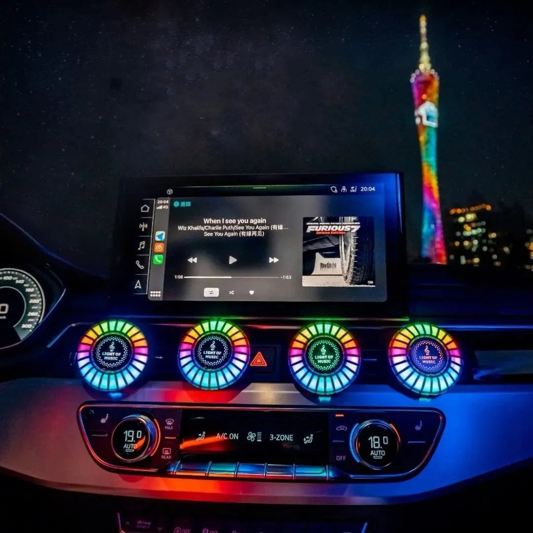 Car atmosphere light with RGB lighting installed in air vent, showing voice control and aromatherapy functions