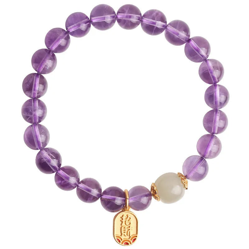 Purple amethyst crystal bead bracelet with geometric shape on an adjustable chain.
