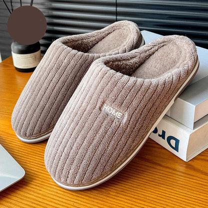 Cozy cotton slippers in various colors, featuring a soft, plush lining and non-slip rubber sole for indoor comfort and warmth