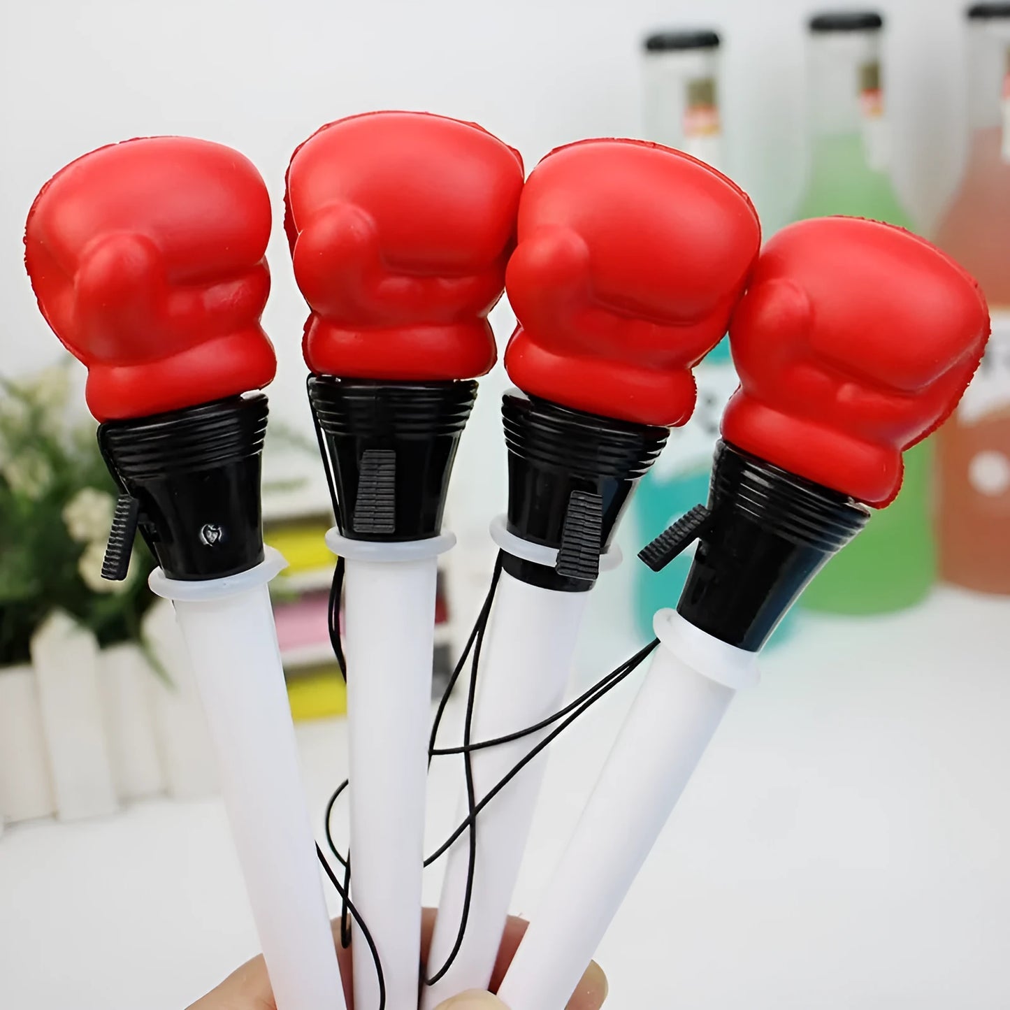 Creative Pressure Relief Boxing Press Pen with plug-in sleeve and 0.7mm bullet tip, set of four black ink pens