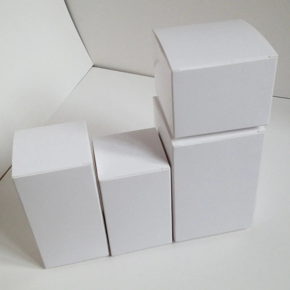 White paper storage boxes showing size variations from 3x3cm to 10x10cm base with different height options