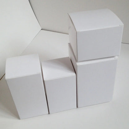 White paper storage boxes showing size variations from 3x3cm to 10x10cm base with different height options