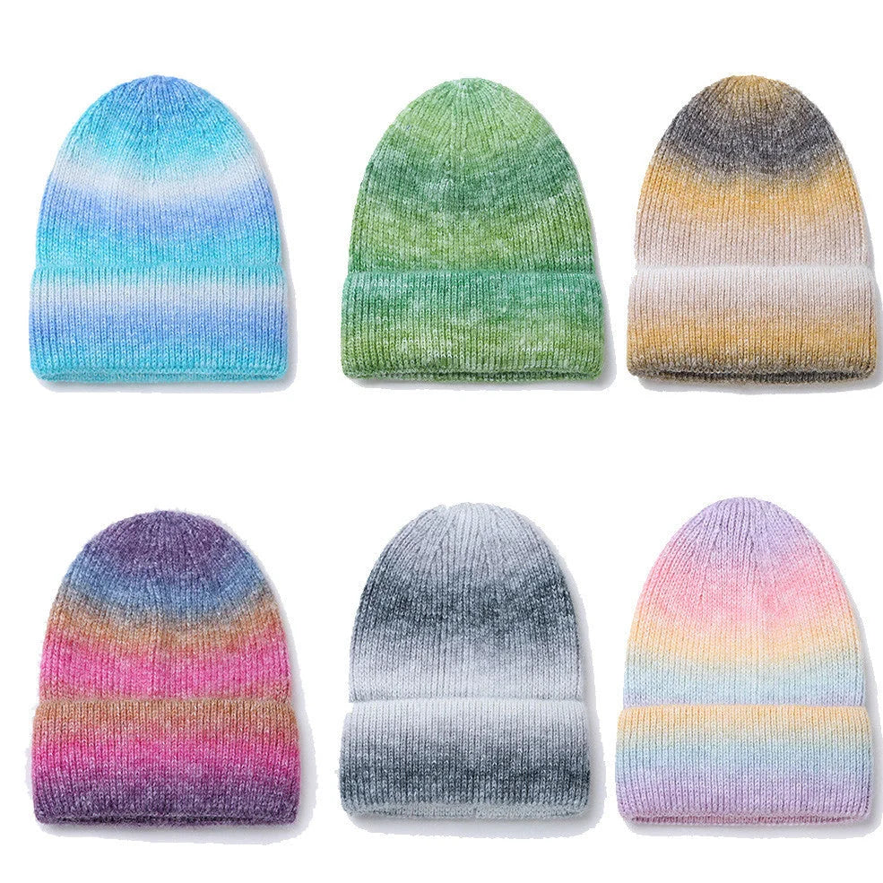 Gradient yarn knitted hat with tapered top in light blue colour showing knitted texture
