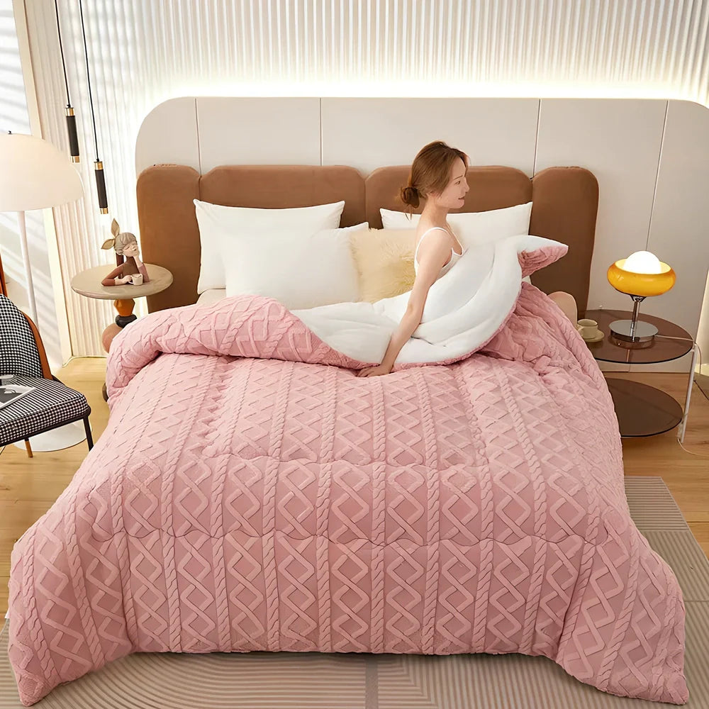 Double quilted plush quilt in sapphire blue showing detailed stitching and German velvet texture