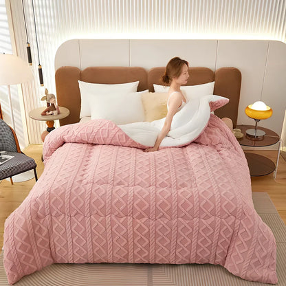 Double quilted plush quilt in sapphire blue showing detailed stitching and German velvet texture