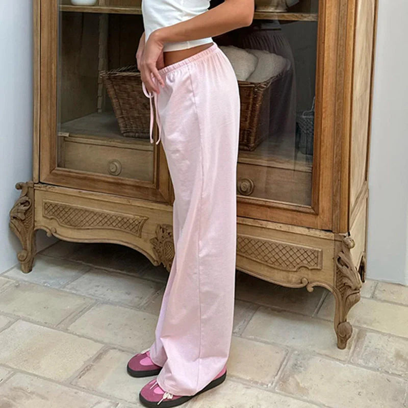 Stylish women's striped pants in various colors with a casual, Y2K-inspired design