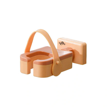 Adjustable wall-mounted hair dryer rack in orange, pink, and green