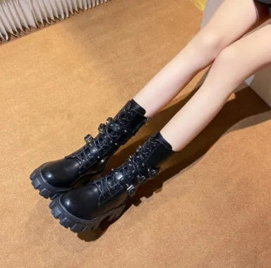 Women's black mid-calf knight boots with side zipper and metal buckle details