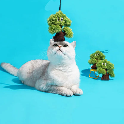 Pine tree-shaped fabric cat toy bag pendant with a hanging loop.