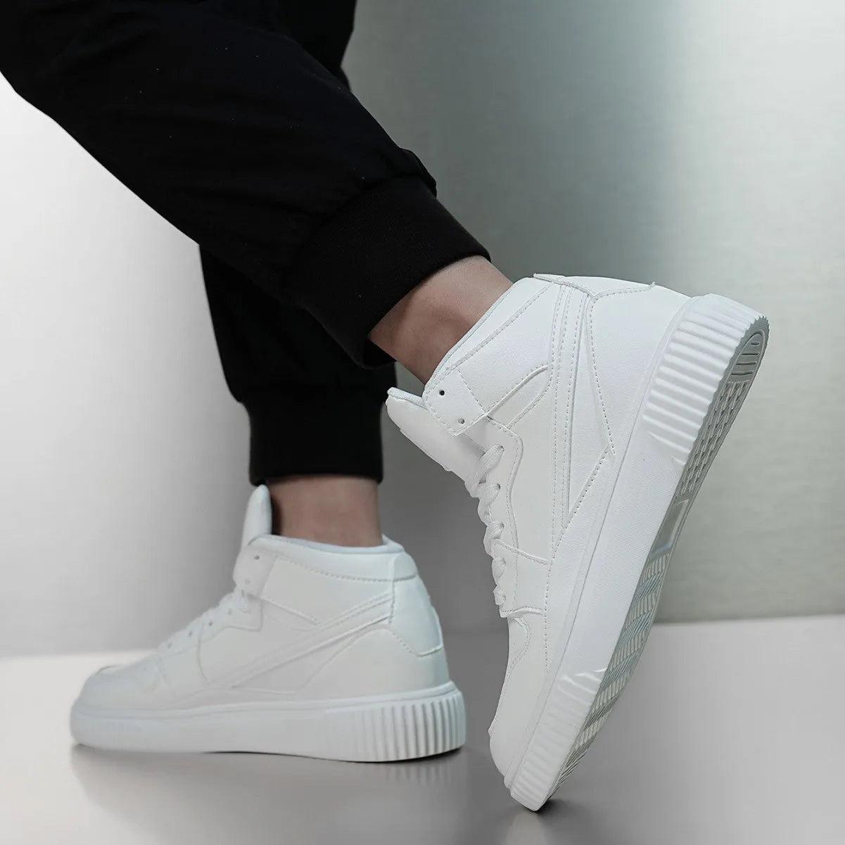 Men's white casual shoes with round toe design and microfiber upper, shown in size 42 on neutral background