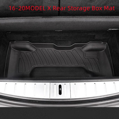 Black TPE rubber floor mats for Tesla Model 3, showing deep grooves and raised edges on driver's side.