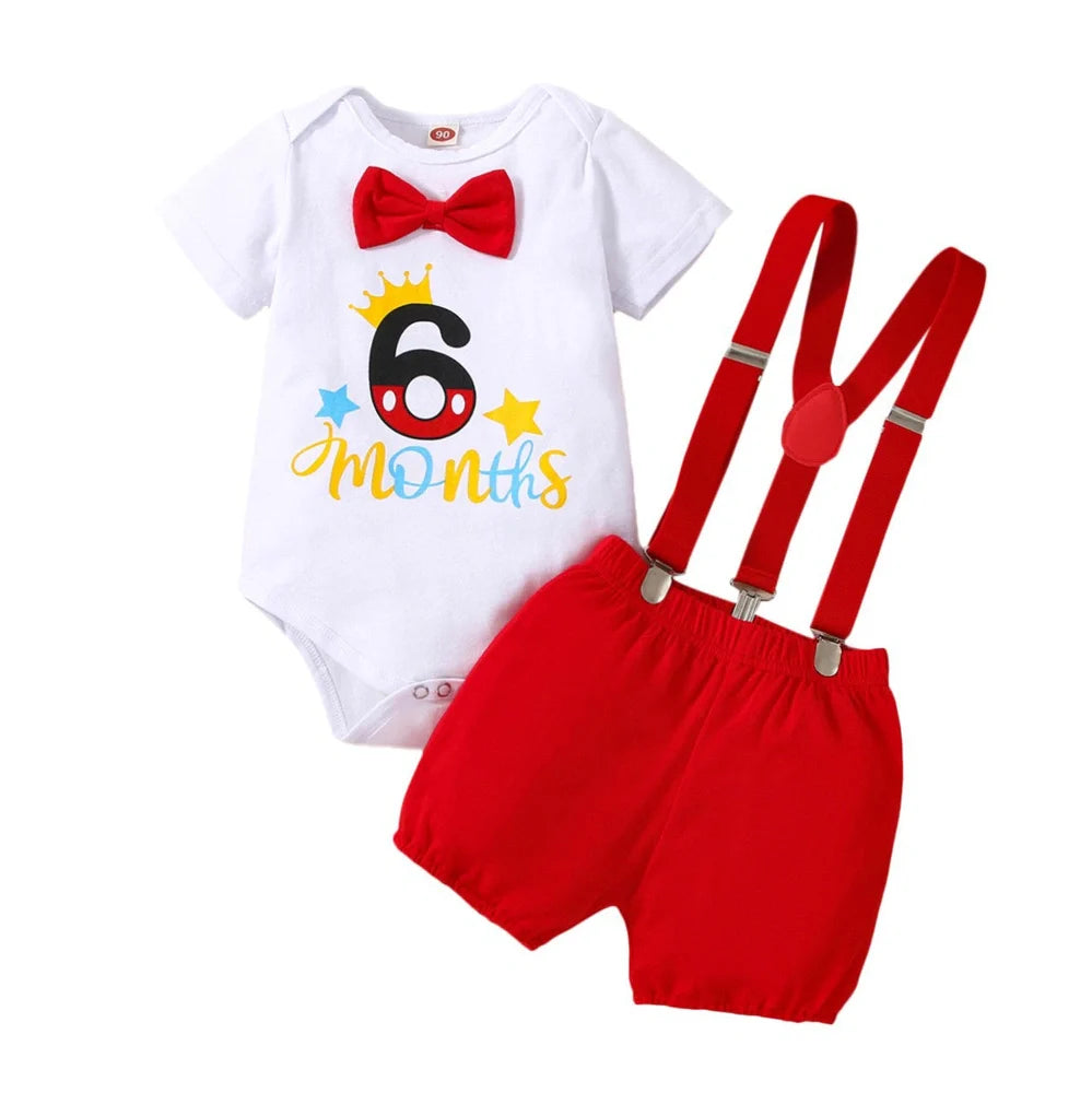 Red cotton baby romper with suspender shorts and printed letters for birthday celebrations