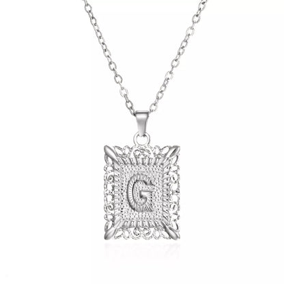 Personalized initial letter necklace in gold or steel, featuring any letter from A to Z