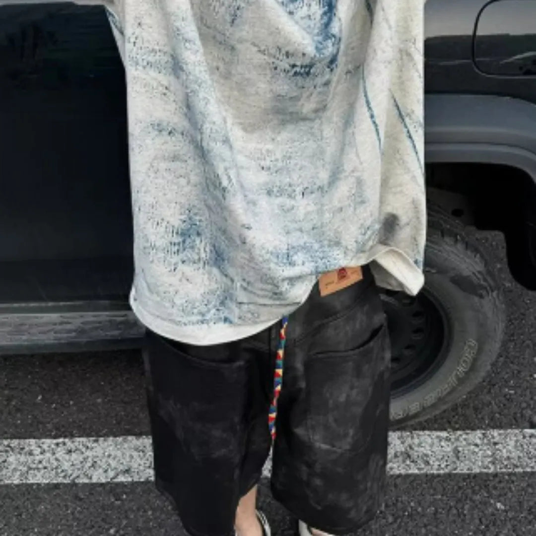Korean-style loose fit T-shirt with round neck, short sleeves, and head cover detail in solid colour